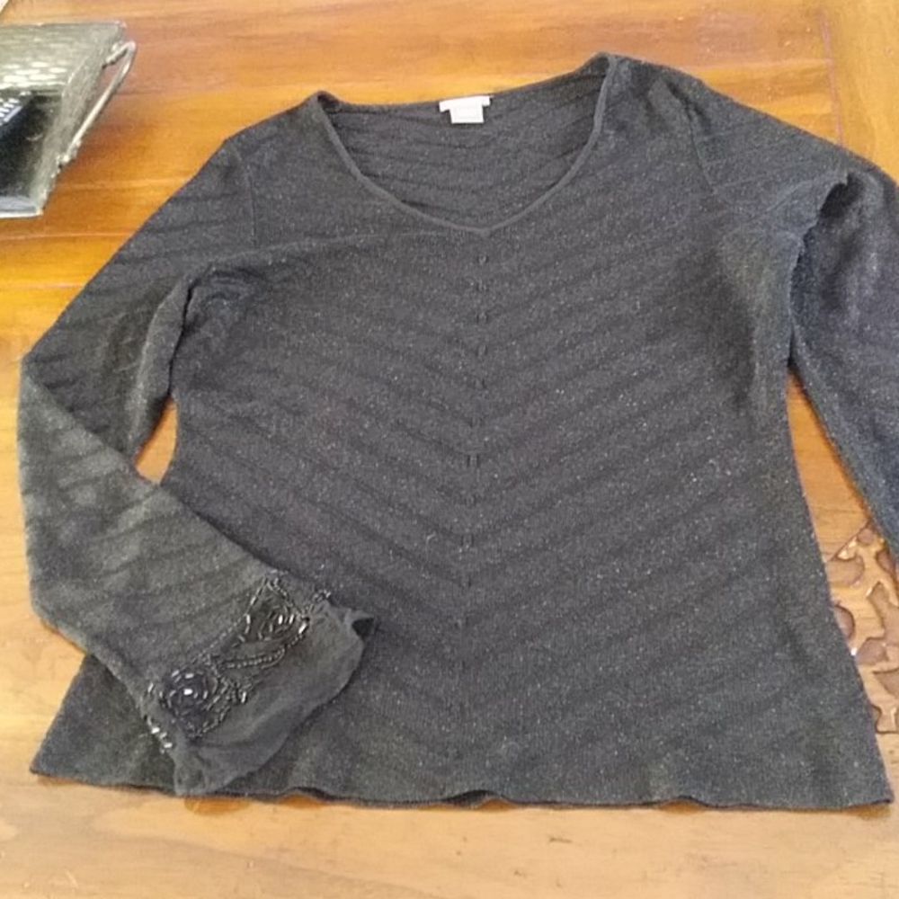 Women's beaded black sweater.